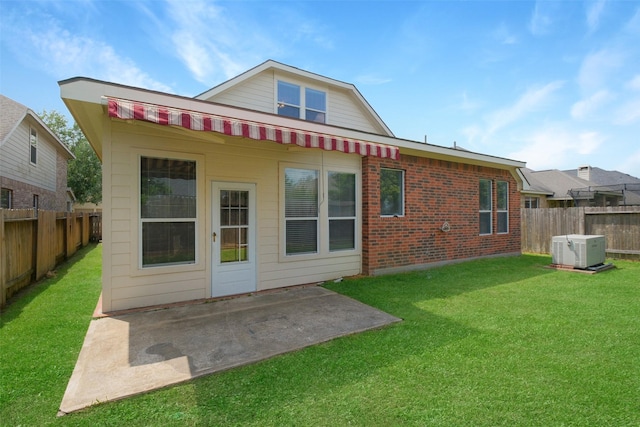 2835 Chalet Knolls Ln, Katy, TX 77494 - rear view of house with a patio area and brick siding