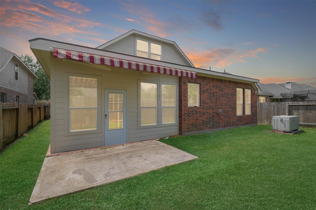 2835 Chalet Knolls Ln, Katy, TX 77494 - rear view of property with a patio and brick siding