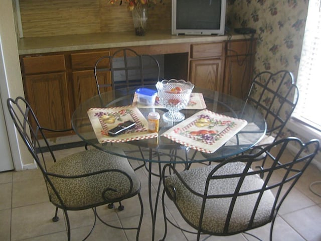 6845 Chasewood Dr, Missouri City, TX 77489 - dining area with light tile patterned floors