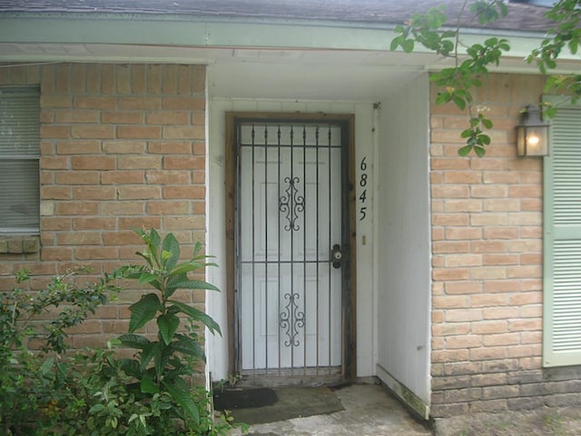6845 Chasewood Dr, Missouri City, TX 77489 - property entrance featuring brick siding