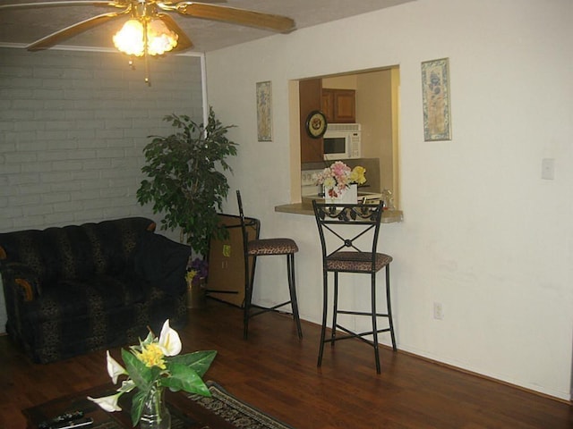 6845 Chasewood Dr, Missouri City, TX 77489 - living room with ceiling fan and wood finished floors