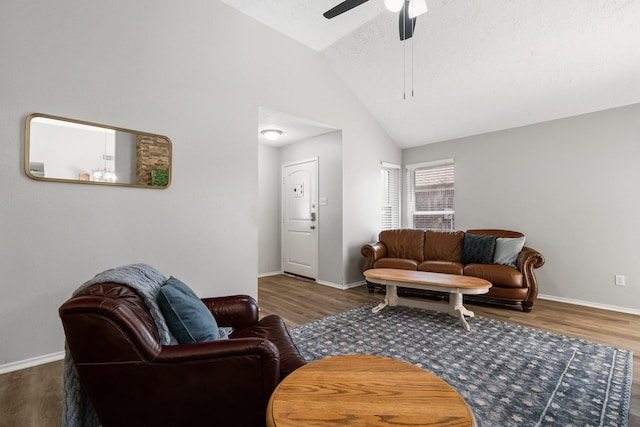 31311 N Head Dr, Spring, TX 77386 - living room featuring lofted ceiling, ceiling fan, wood finished floors, and baseboards