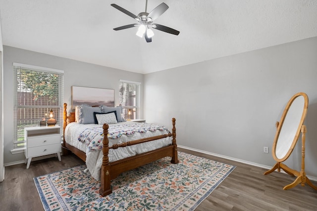 31311 N Head Dr, Spring, TX 77386 - bedroom with vaulted ceiling, baseboards, wood finished floors, and ceiling fan