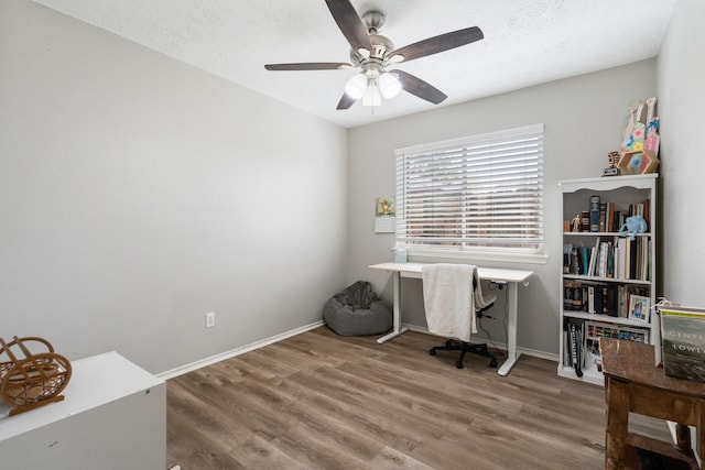 31311 N Head Dr, Spring, TX 77386 - office with ceiling fan, wood finished floors, baseboards, and a textured ceiling