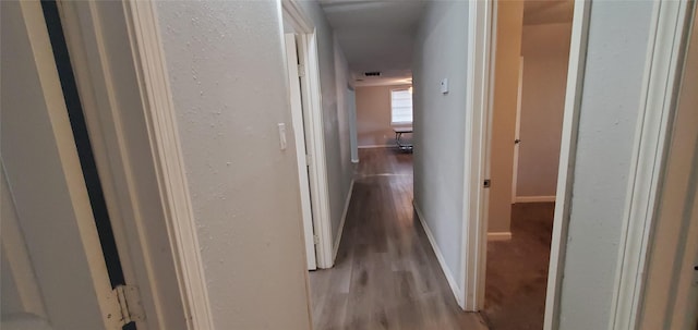 10341 Caxton St, Houston, TX 77016 - hall featuring light wood finished floors and baseboards
