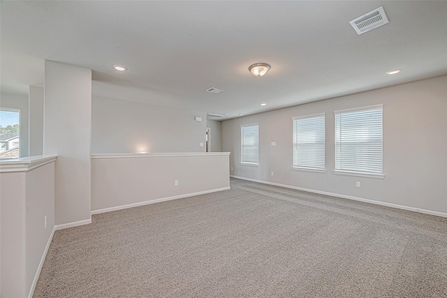 27072 Badger Way, Magnolia, TX 77354 - empty room featuring carpet flooring, baseboards, and recessed lighting