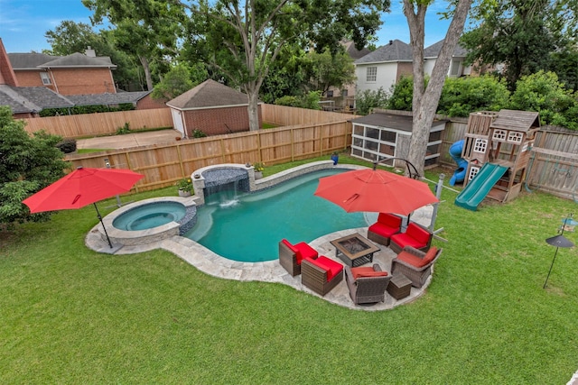 view of swimming pool with a playground, a fire pit, a pool with connected hot tub, and a patio