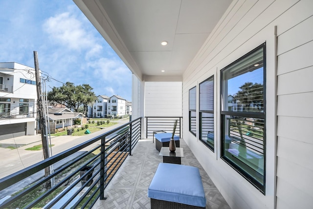 balcony featuring a residential view