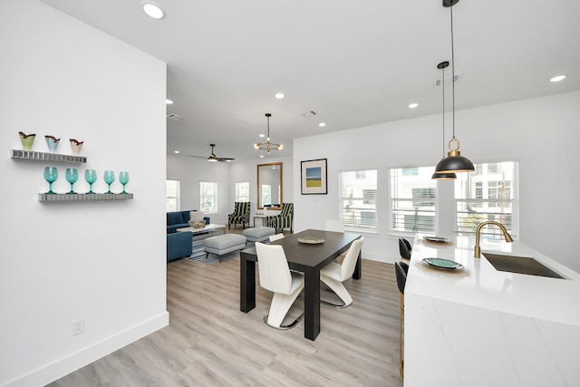 dining area featuring recessed lighting, baseboards, plenty of natural light, light wood-style floors, and ceiling fan
