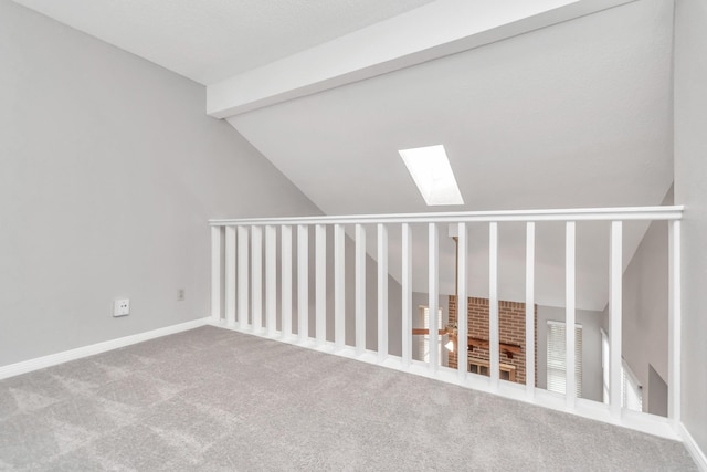 2815 Panagard Dr Unit 38, Houston, TX 77082 - additional living space with lofted ceiling, a skylight, carpet, and baseboards