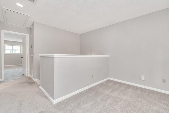 2815 Panagard Dr Unit 38, Houston, TX 77082 - carpeted empty room featuring attic access and baseboards