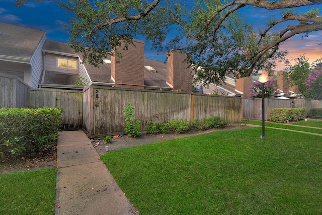 2815 Panagard Dr Unit 38, Houston, TX 77082 - view of yard at dusk