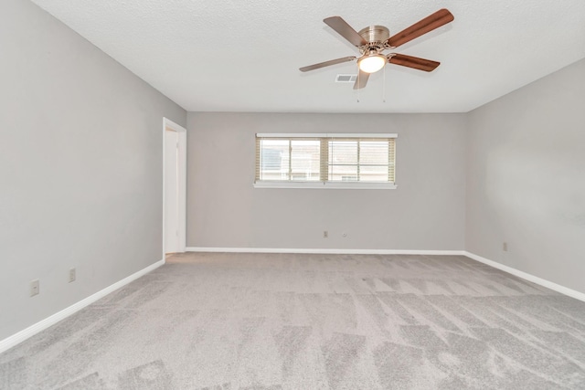 2815 Panagard Dr Unit 38, Houston, TX 77082 - spare room featuring carpet, a ceiling fan, and baseboards