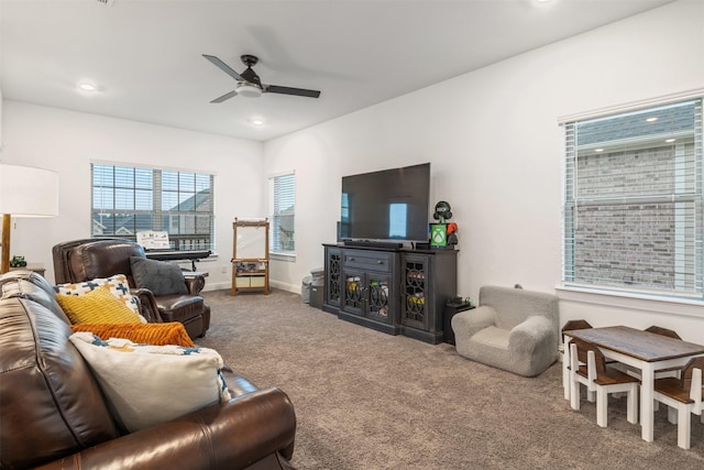 517 Sage Timbers Ln, Pinehurst, TX 77362 - carpeted living room featuring a ceiling fan, recessed lighting, and baseboards