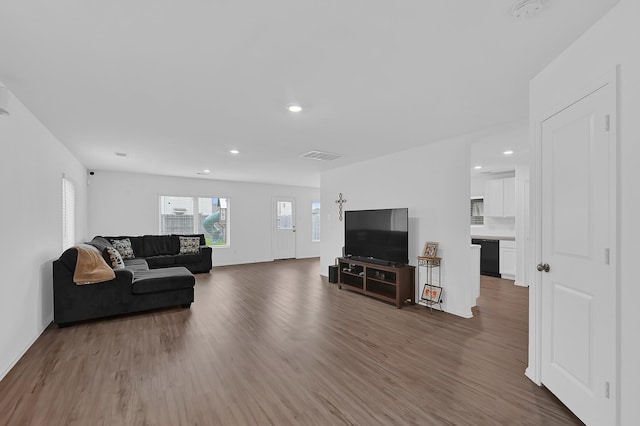 7826 Switchgrass Creek Dr, Katy, TX 77493 - living room with wood finished floors and recessed lighting