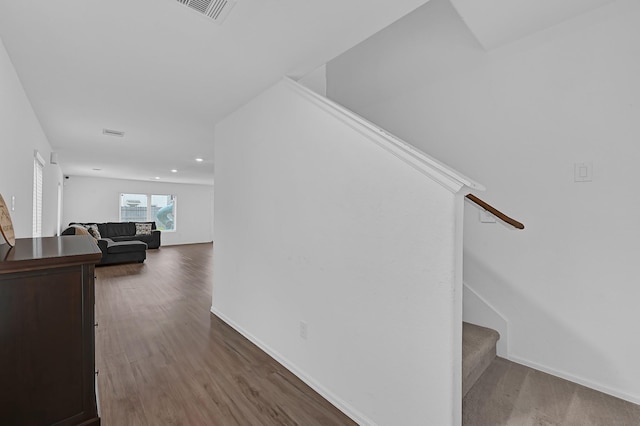 7826 Switchgrass Creek Dr, Katy, TX 77493 - hall with stairs, wood finished floors, recessed lighting, and baseboards