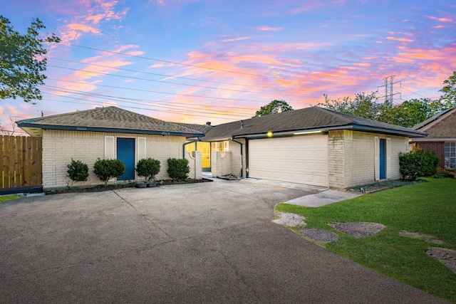 10431 Sagewillow Ln, Houston, TX 77089 - view of front facade with brick siding, asphalt driveway, an attached garage, and a shingled roof