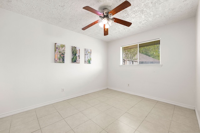 10431 Sagewillow Ln, Houston, TX 77089 - empty room featuring a textured ceiling, a ceiling fan, baseboards, and light tile patterned floors