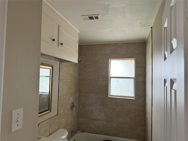 bathroom with shower / bathtub combination