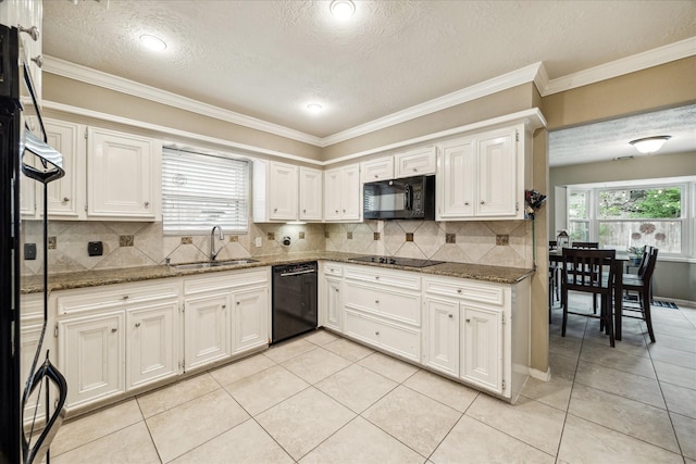 11730 Cypresswood Dr, Houston, TX 77070 - kitchen featuring black appliances, a sink, light tile patterned floors, dark stone counters, and a textured ceiling