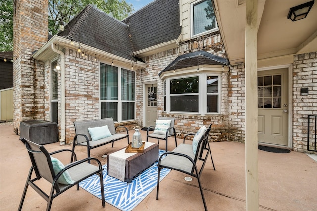 11730 Cypresswood Dr, Houston, TX 77070 - view of patio featuring an outdoor living space