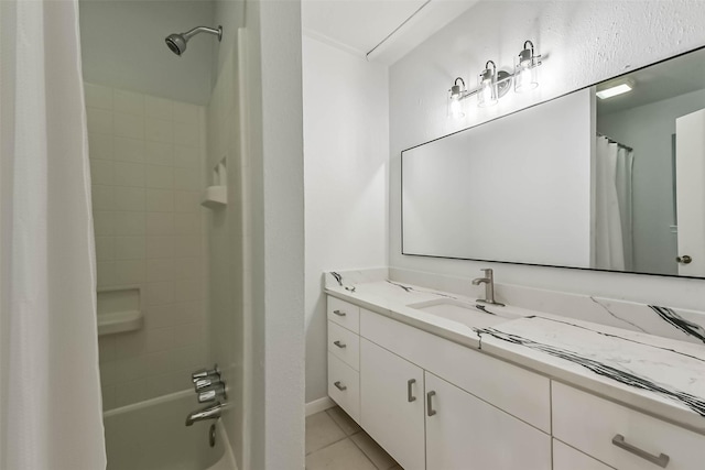 full bathroom with vanity and tile patterned flooring