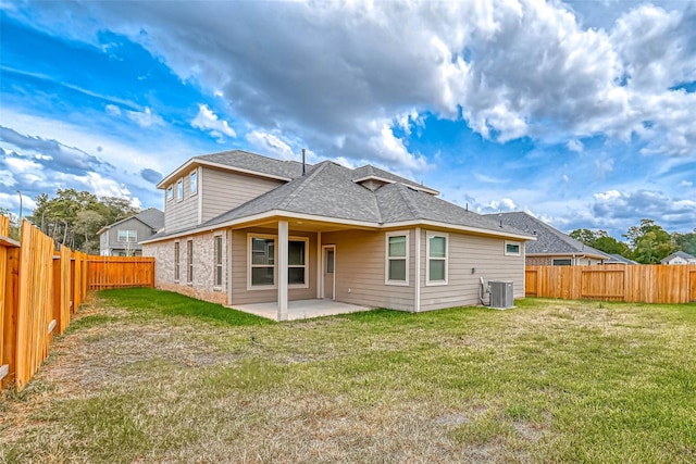 10256 Badger Run Ln, Magnolia, TX 77354 - rear view of property featuring a patio area, a shingled roof, and central AC