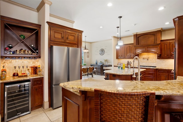 39 New Oak Trl, Humble, TX 77346 - kitchen with beverage cooler, appliances with stainless steel finishes, ornamental molding, tasteful backsplash, and light stone countertops