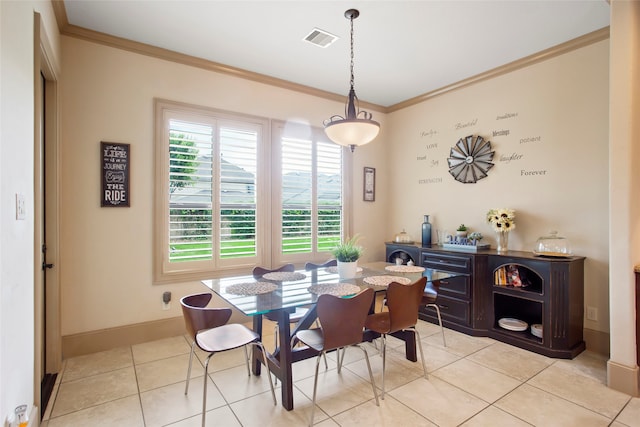 39 New Oak Trl, Humble, TX 77346 - dining area featuring ornamental molding, baseboards, and light tile patterned flooring
