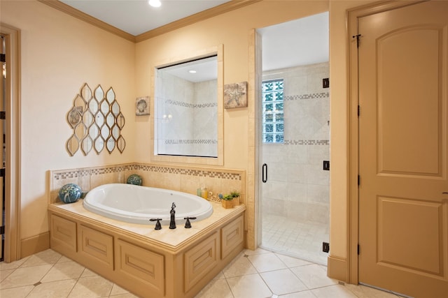 39 New Oak Trl, Humble, TX 77346 - bathroom with tile patterned floors, a garden tub, a shower stall, and ornamental molding
