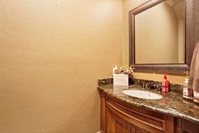 39 New Oak Trl, Humble, TX 77346 - bathroom featuring vanity and a textured wall