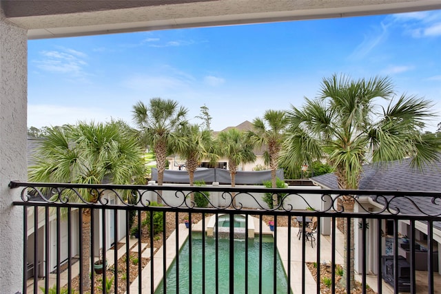 39 New Oak Trl, Humble, TX 77346 - balcony with a pool with connected hot tub and view of pool