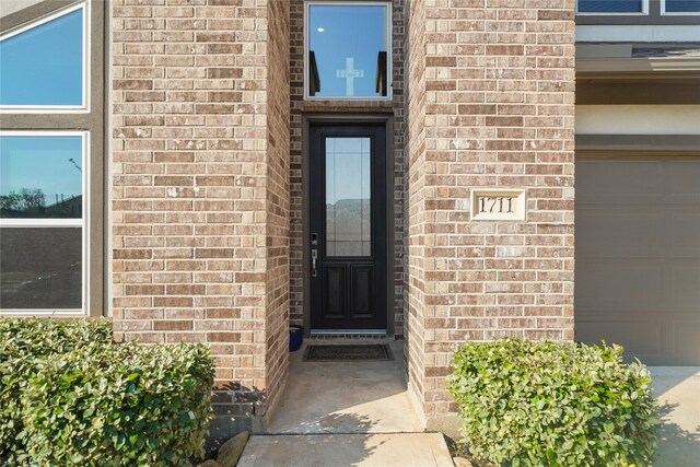 1711 Country Air Ln, Missouri City, TX 77459 - entrance to property featuring brick siding and a garage