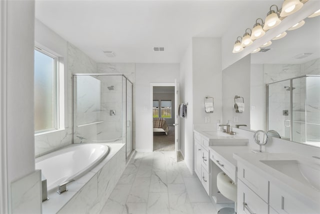 1711 Country Air Ln, Missouri City, TX 77459 - full bath with marble finish floors, plenty of natural light, ensuite bath, and a marble finish shower