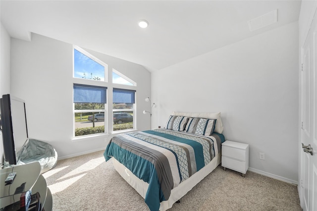 1711 Country Air Ln, Missouri City, TX 77459 - carpeted bedroom featuring vaulted ceiling and baseboards