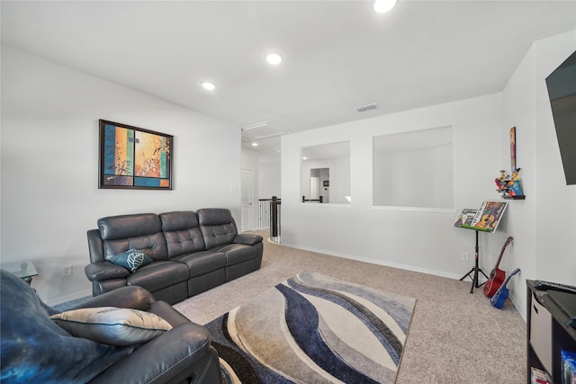 1711 Country Air Ln, Missouri City, TX 77459 - carpeted living room with attic access, recessed lighting, and baseboards