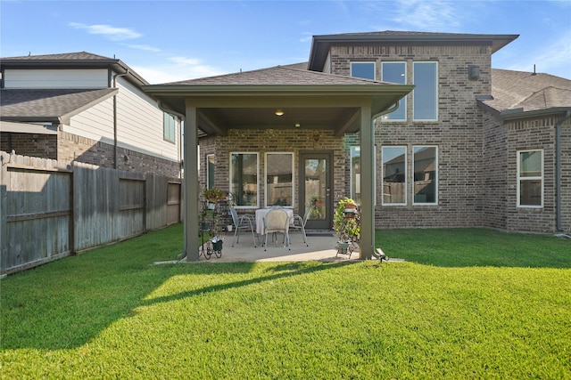 1711 Country Air Ln, Missouri City, TX 77459 - rear view of property with brick siding and a patio