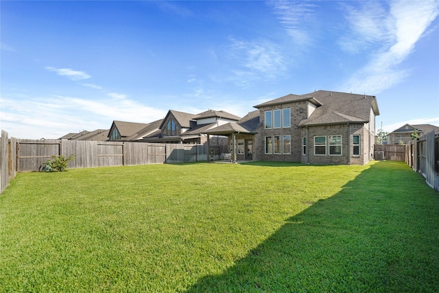 1711 Country Air Ln, Missouri City, TX 77459 - rear view of house featuring a gazebo, brick siding, and a shingled roof