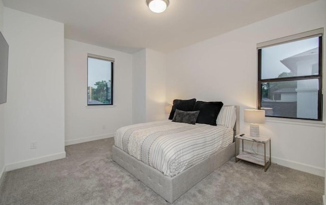 8911 Orchard Cv, Missouri City, TX 77459 - carpeted bedroom featuring baseboards