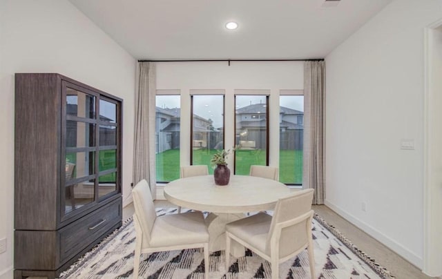 8911 Orchard Cv, Missouri City, TX 77459 - dining area with baseboards and recessed lighting