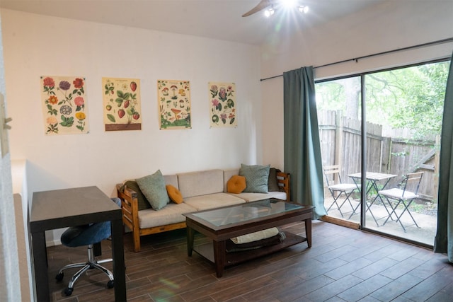 11404 Walnut Ridge Dv Unit 103, Austin, TX 78753 - living room with dark wood-type flooring and a ceiling fan