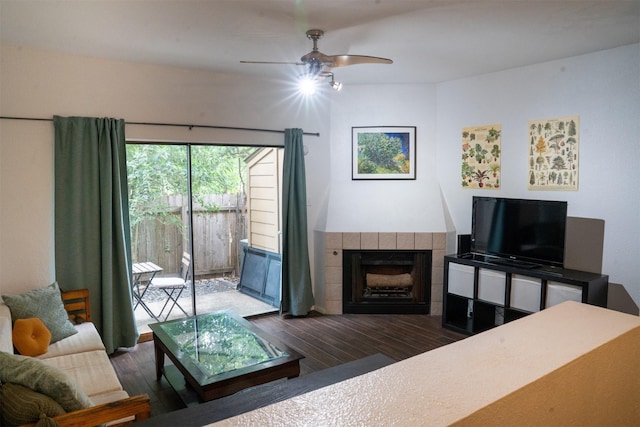 11404 Walnut Ridge Dv Unit 103, Austin, TX 78753 - living area featuring wood finished floors, ceiling fan, and a fireplace
