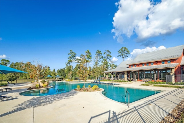 7918 Silver Grove Dr, Magnolia, TX 77354 - community pool featuring a patio area and fence