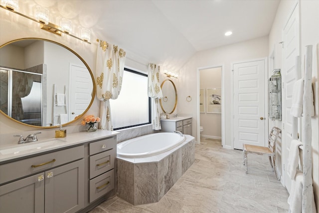 7918 Silver Grove Dr, Magnolia, TX 77354 - full bathroom with a garden tub, a stall shower, toilet, vanity, and marble finish flooring