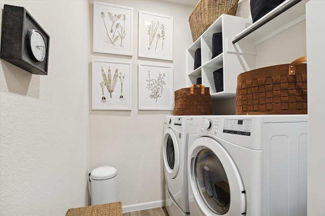 7918 Silver Grove Dr, Magnolia, TX 77354 - washroom featuring washing machine and clothes dryer and wood finished floors