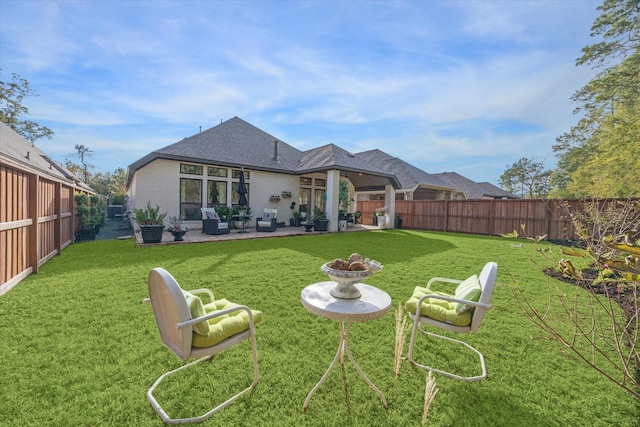 7918 Silver Grove Dr, Magnolia, TX 77354 - rear view of house featuring a patio area and brick siding