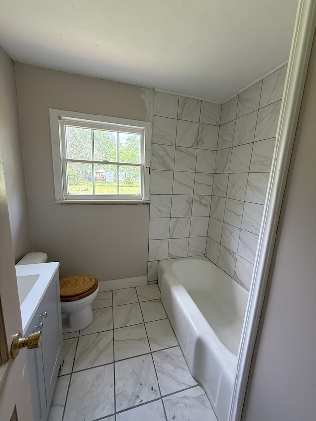 1510 Oleander Dr, La Marque, TX 77568 - bathroom featuring marble finish floors, toilet, a bathtub, vanity, and a shower