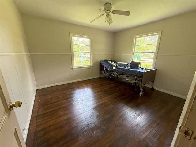 1510 Oleander Dr, La Marque, TX 77568 - bedroom with multiple windows, wood finished floors, and baseboards