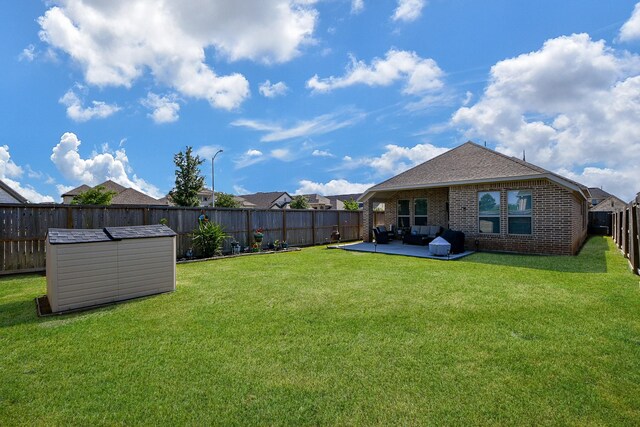 2543 Summer Peach St, Katy, TX 77494 - view of yard with a patio and an outdoor living space