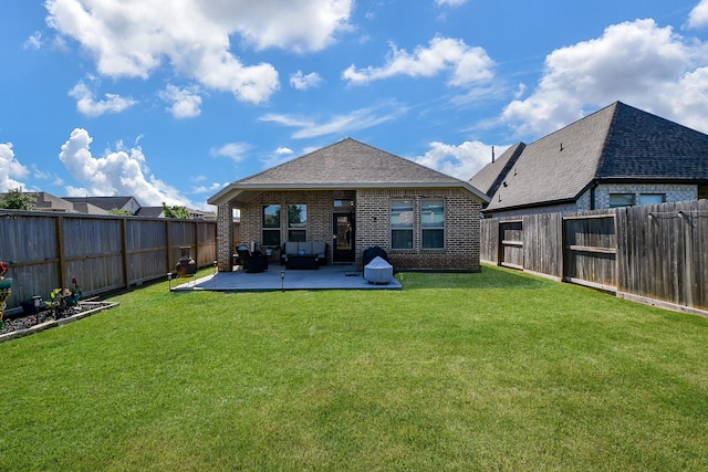 2543 Summer Peach St, Katy, TX 77494 - rear view of house with brick siding, a patio, a shingled roof, and outdoor lounge area